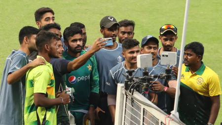 Pakistan cricket team captin Babar Azam obliges for a selfie during a practice session ahead of the Pakistan vs Bangladesh Cricket World Cup match at Kolkata's Eden Gardens. Express photo by Partha Paul.