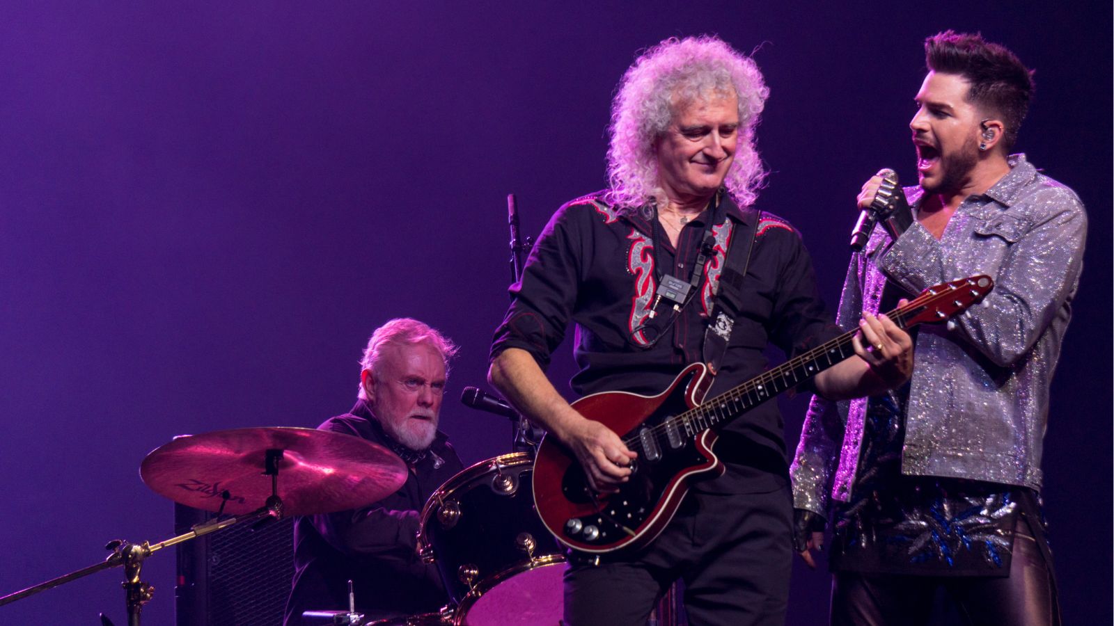 Brian May and Queen performing with Adam Lambert in 2017.