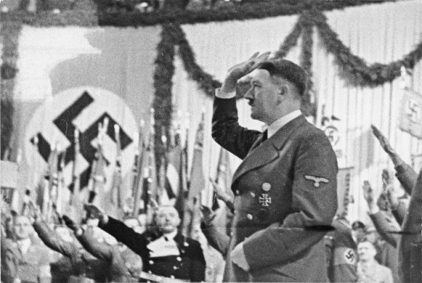 Adolf Hitler used to answer the common salute with his modified version, where his palm was parallel to the sky. 