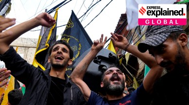 People celebrate the attacks that the militant Hamas group carried out against Israel, at Bourj al-Barajneh Palestinian refugee camp, in Beirut, Lebanon, Saturday, Oct. 7, 2023.