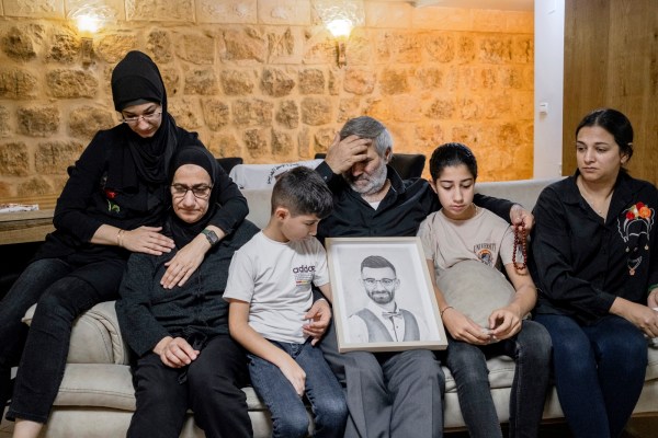 The family of Awad Darawshe, who was killed by Hamas at a music festival, at their home in Iksal, Israel, on Oct. 20, 2023. Long derided as naïve, even traitors, the bridge builders between Israelis and Palestinians sense opportunity in the aftermath of the Hamas attack. (Amit Elkayam/The New York Times)