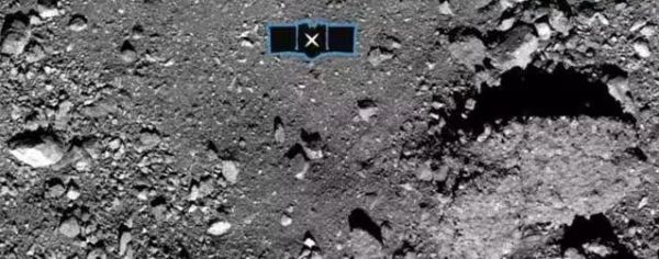 This image shows the OSIRIS-REx spacecraft's primary sample collection site, named "Nightingale," on the asteroid Bennu. (NASA/Goddard/University of Arizona via AP)