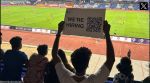 Placard about job postings during ISL match in Bengaluru