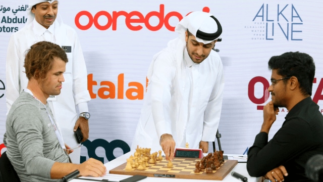 India's Karthikeyan Murali takes on World No 1 Magnus Carlsen at the Qatar Masters tournament. (PHOTO: X/Qatar Chess)