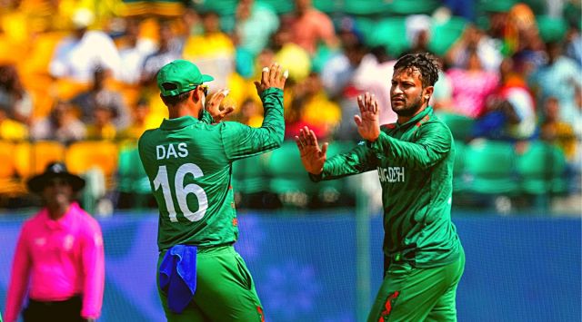 Bangladesh's Shakib Al Hasan celebrates with teammates after taking the wicket of Afghanistan's Rahmat Shah during an ICC Men’s World Cup 2023 match, at HPCA Stadium, in Dharamshala, Saturday, Oct. 7, 2023. (PTI Photo)