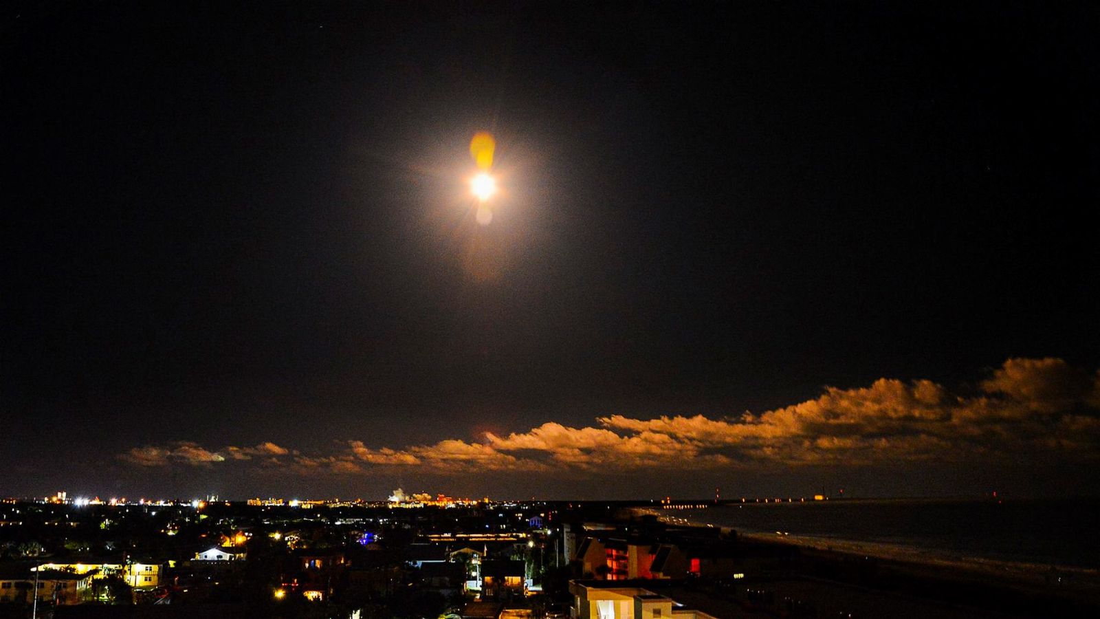 A SpaceX Falcon 9 rocket illuminates the sky as it is launched from Complex 40 at Cape Canaveral Space Force in Fla., Tuesday, Oct. 17, 2023. The rocket is carrying a batch of Starlink satellites.