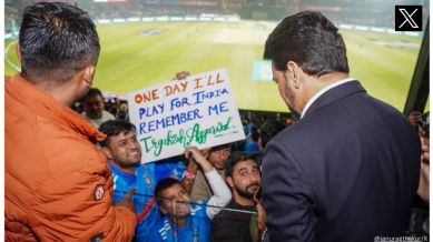 Sports Minister Anurag Thakur impressed by little boy’s placard during India-New Zealand match