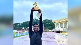 blore-boy Kevin Siddi with the best athlete award at the Karnataka state athletics meet in Warangal.