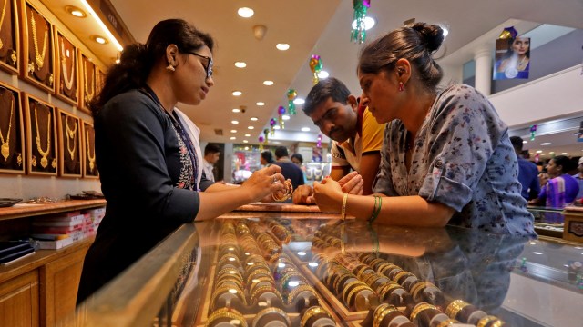 Spot gold was down 0.4 per cent at $1,972.39 per ounce by 0334 GMT, and US gold futures slid 0.5 per cent to $1,983.50.