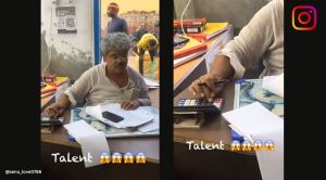 man using calculator without looking