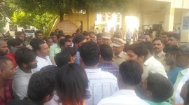 Police try to control a crowd outside the hospital.DeepakJoshi