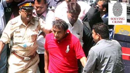 Vijay Palande, one of the accused in the case along with Dhananjay Shinde, Manoj Gajkosh were produced in the Andheri court killing of Delhi-based businessman Arunkumar Tikku. (Express Archive)