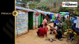 People who fled Myanmar sit outside their sheds in a relief camp at the border village of Zokhawthar, Champhai district, in India's northeastern state of Mizoram, India, November 15, 2023.