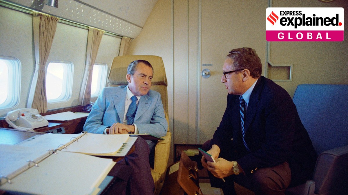 U.S. President Richard Nixon and National Security Adviser Henry Kissinger speak on Air Force One during their voyage to China, on February 20, 1972.