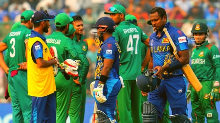 Sri Lankan batter Angelo Mathews leaves the ground after being given 'timed out' by umpire as Bangladeshi players celebrate his wicket during the ICC Cricket World Cup 2023 match between Sri Lanka and Bangladesh, at the Arun Jaitley Cricket Stadium in New Delhi, Monday, Nov. 6, 2023. (PTI Photo)