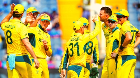 Australia’s Marnus Labuschagne celebrates with teammates after taking the wicket of Bangladesh’s Mahmudullah through run out during the ICC Men's Cricket World Cup 2023 match between Australia and Bangladesh, at Maharashtra Cricket Association Stadium, in Pune, Saturday, Nov. 11, 2023. (PTI