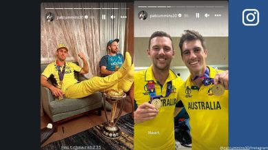Australia’s Mitchell Marsh rests feet on World Cup trophy after defeating India in final