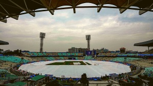 The whole ground at Eden Gardens in Kolkata is covered due to the forecast for rains during the Cricket World Cup semi-final between Australia and South Africa on Thursday. (PTI Photo)