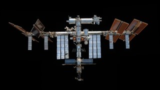 A mosaic image of the International Space Station as pictured by a Crew Dragon spacecraft in 2021. (NASA)