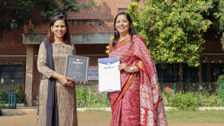 The school's esteemed leaders, adorned with awards