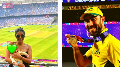 Vini Raman and Australia's Glenn Maxwell celebrates with his medal after winning the ICC Cricket World Cup REUTERS