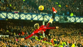 Manchester United's Alejandro Garnacho scores his side's first goal during the English Premier League soccer match between Everton and Manchester United, at Goodison Park Stadium, in Liverpool, England, Sunday , Nov. 26, 2023. (AP Photo