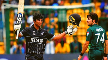 New Zealand’s Rachin Ravindra celebrates his century during the ICC Men's Cricket World Cup 2023 match between New Zealand and Pakistan at M. Chinnaswamy Stadium, in Bengaluru, Saturday, Nov. 4, 2023. (PTI Photo
