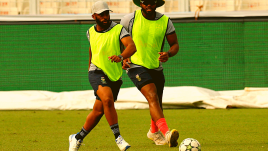 South Africa's Temba Bavuma plays football during practice REUTERS
