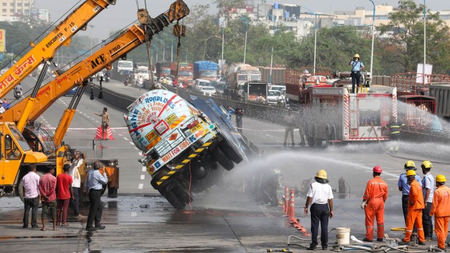 Panic, traffic diversion as gas tanker overturns on highway