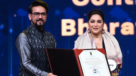Union Information and Broadcasting Minister Anurag Thakur with actor Madhuri Dixit.