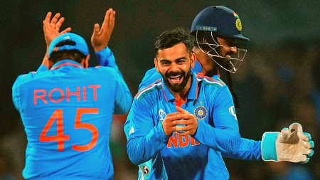 India's Virat Kohli, centre, celebrates the wicket of Netherlands' captain Scott Edwards during the ICC Men's Cricket World Cup match between India and Netherlands in Bengaluru, India, Sunday, Nov. 12, 2023. (AP Photo