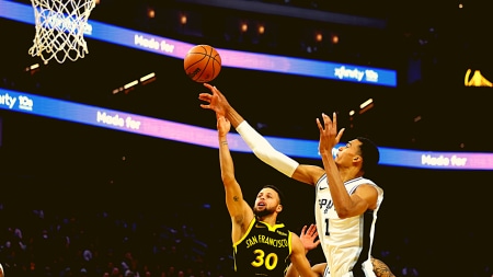 San Antonio Spurs center Victor Wembanyama (1) blocks a shot by Golden State Warriors guard Stephen Curry (30) during the first half of an NBA basketball In-Season Tournament game in San Francisco, Friday, Nov. 24, 2023. (AP Photo