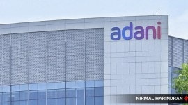 Adani Enterprises reported a near 50% drop in second-quarter profit on Thursday, hurt by weakness in its key coal trading division due to a fall in prices.