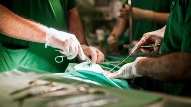 Aligarh Pvt Hospital medical negligence, Aligarh Hospital sealed, woman caesarean section, HIV positive woman, woman HIV report, hospital preliminary inquiry, indian express news