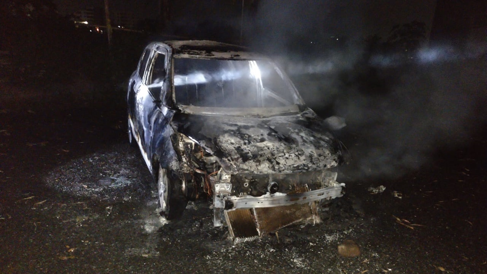 Police said eight two-wheelers and a car were set afire by the suspects in an automobile garage in Narhe. (Express Photo)