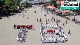 Students form the symbol of 'TB' as they observe World Tuberculosis Day at Ridge in Shimla.