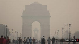 The Kartavya Path, India Gate and the Rashtrapati Bhavan are seen shrouded in a thick smog, as the air quality further deteriorates in the capital on Thursday. (Express Photo by Tashi Tobgyal)