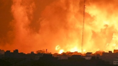 Israel-Hamas War Live: Fire and smoke rises from buildings following Israeli airstrikes on Gaza City, Sunday, Nov. 5, 2023. (AP Photo/Abed Khaled)