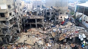 Palestinians look for survivors after an Israeli strike on a building last night in Jebaliya refugee camp, Gaza Strip, Nov. 14, 2023. (AP)