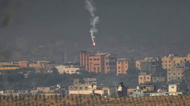 An Israeli army flare is seen over the northern part of the Gaza Strip, as seen from southern Israel, Wednesday, Nov. 1, 2023. (AP Photo/Ariel Schalit)