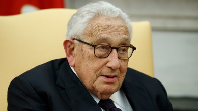 Former US Secretary of State Henry Kissinger speaks during a meeting with President Donald Trump in the Oval Office of the White House, Oct. 10, 2017, in Washington. (AP, file)