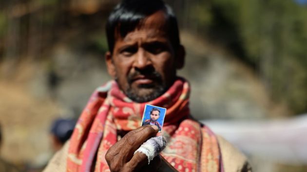 man with son's photo