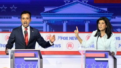 Businessman Vivek Ramaswamy, left, and former U.N. Ambassador Nikki Haley speak during a Republican presidential primary debate hosted by FOX News Channel, Aug. 23, 2023, in Milwaukee.