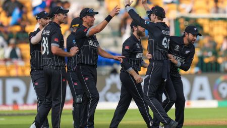 New Zealand players celebrate after taking the catch of Sri Lanka's Dushmantha Chameera during their Cricket World Cup match at M Chinnaswamy Stadium in Bengaluru on Thursday. (PTI Photo)