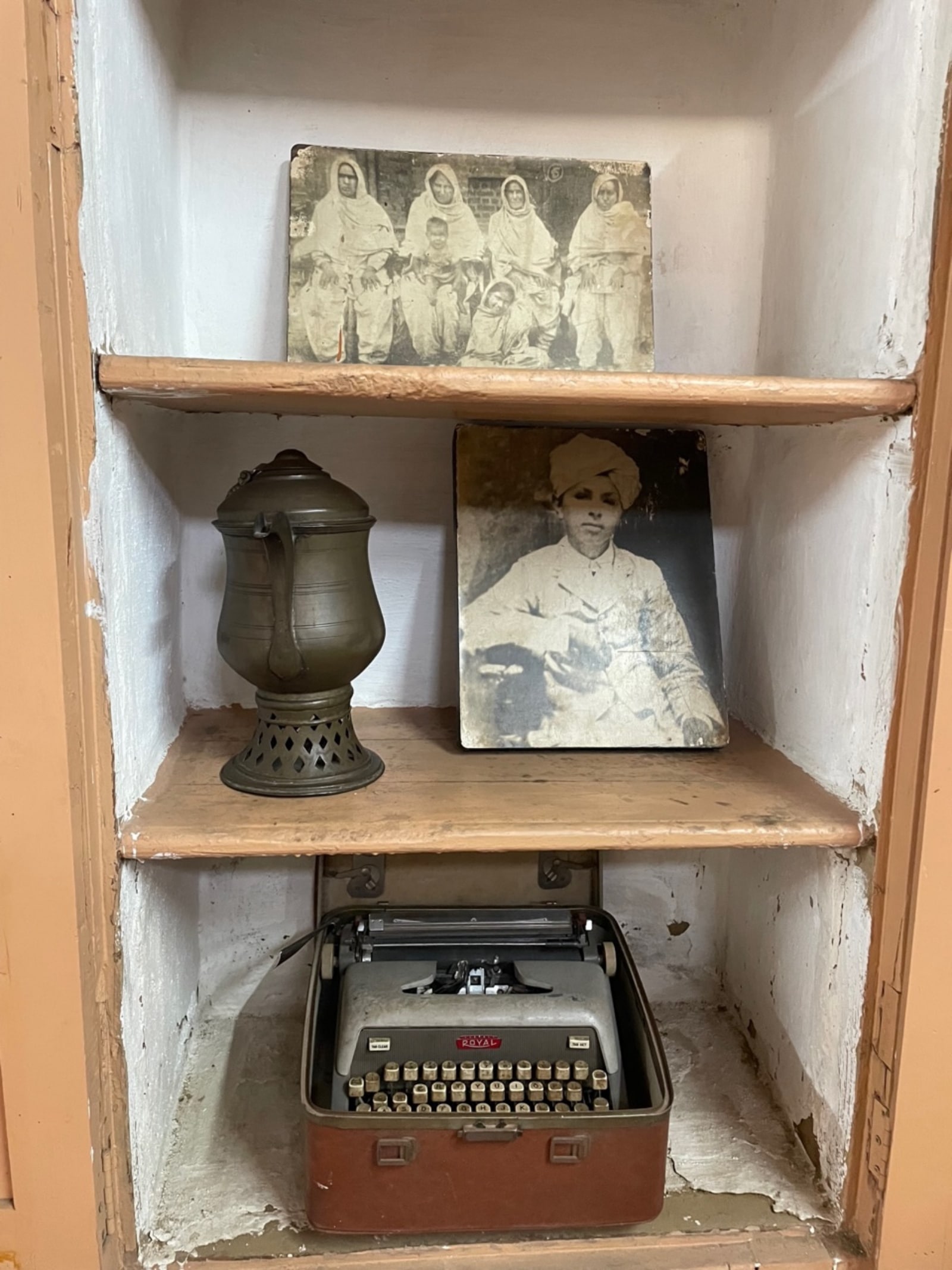 His old photo, a typewriter, a lamp and other belongings of the family displayed in the house 