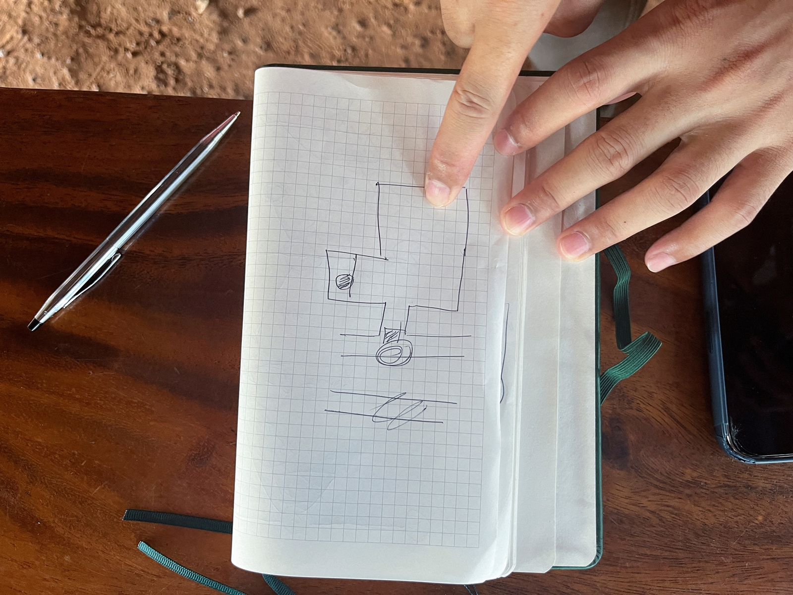 Anucha Angkaew, a Thai farm worker who was abducted by Hamas for over 50 days while working in Israel in October, shows a drawing design of one of the rooms where he was held captive in Gaza, at his family home in Don Pila village in Udon Thani province, Thailand December 6, 2023. REUTERS/Devjyot Ghoshal