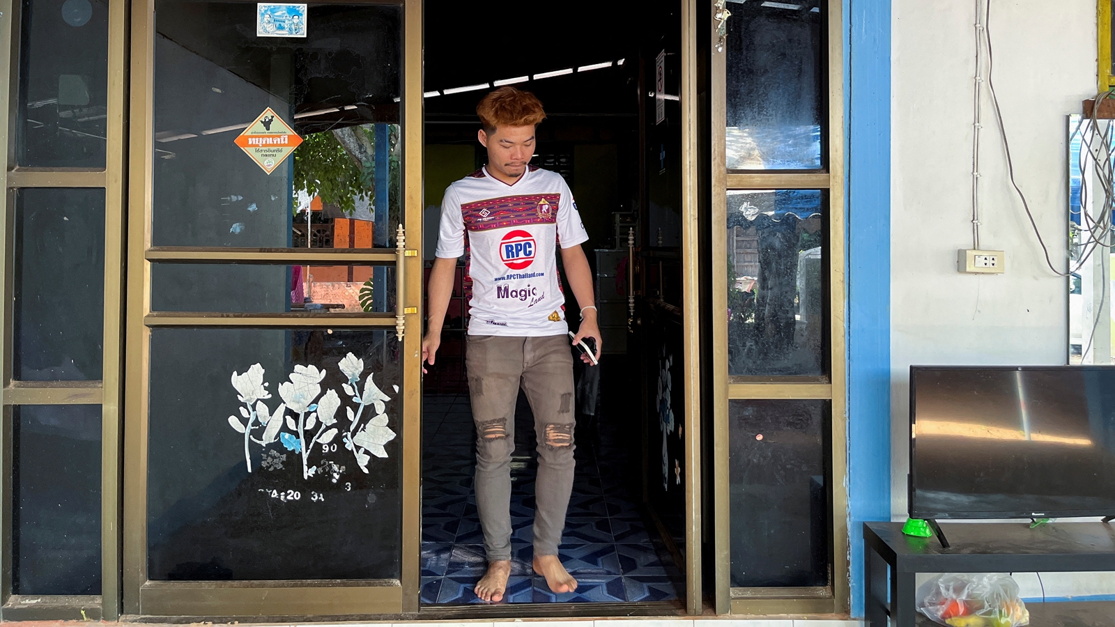 Anucha Angkaew, a Thai farm worker who was abducted by Hamas while working in Israel in October and spent over 50 days in captivity in Gaza, walks at his family home in Don Pila village is in Udon Thani province, Thailand, December 6, 2023. (Reuters)