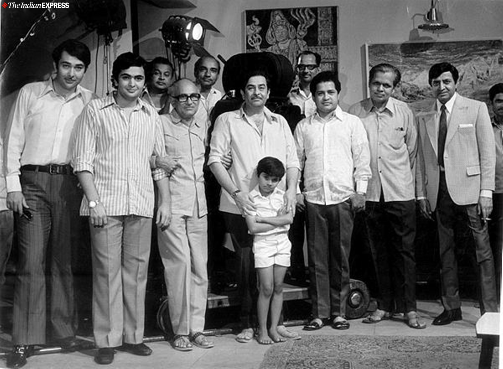 Film star Randhir Kapoor, Rishi Kapoor, Kalachandra, KA Abbas, Radhu Karmakar, Raj Kapoor, Master Chintu, Laxmikant, VP Sathu and Pran on the set of film BOBBY. Express archive photo