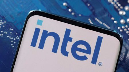 A smartphone with a displayed Intel logo is placed on a computer motherboard in this illustration taken March 6, 2023. REUTERS/Dado Ruvic/Illustration/File Photo/File Photo
