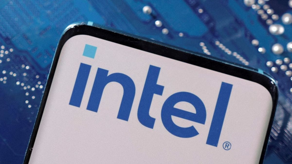 A smartphone with a displayed Intel logo is placed on a computer motherboard in this illustration taken March 6, 2023. REUTERS/Dado Ruvic/Illustration/File Photo/File Photo